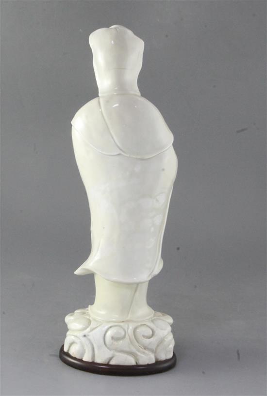 A large Chinese Dehua blanc de chine figure of Guanyin, Kangxi period, height 39cm, restored